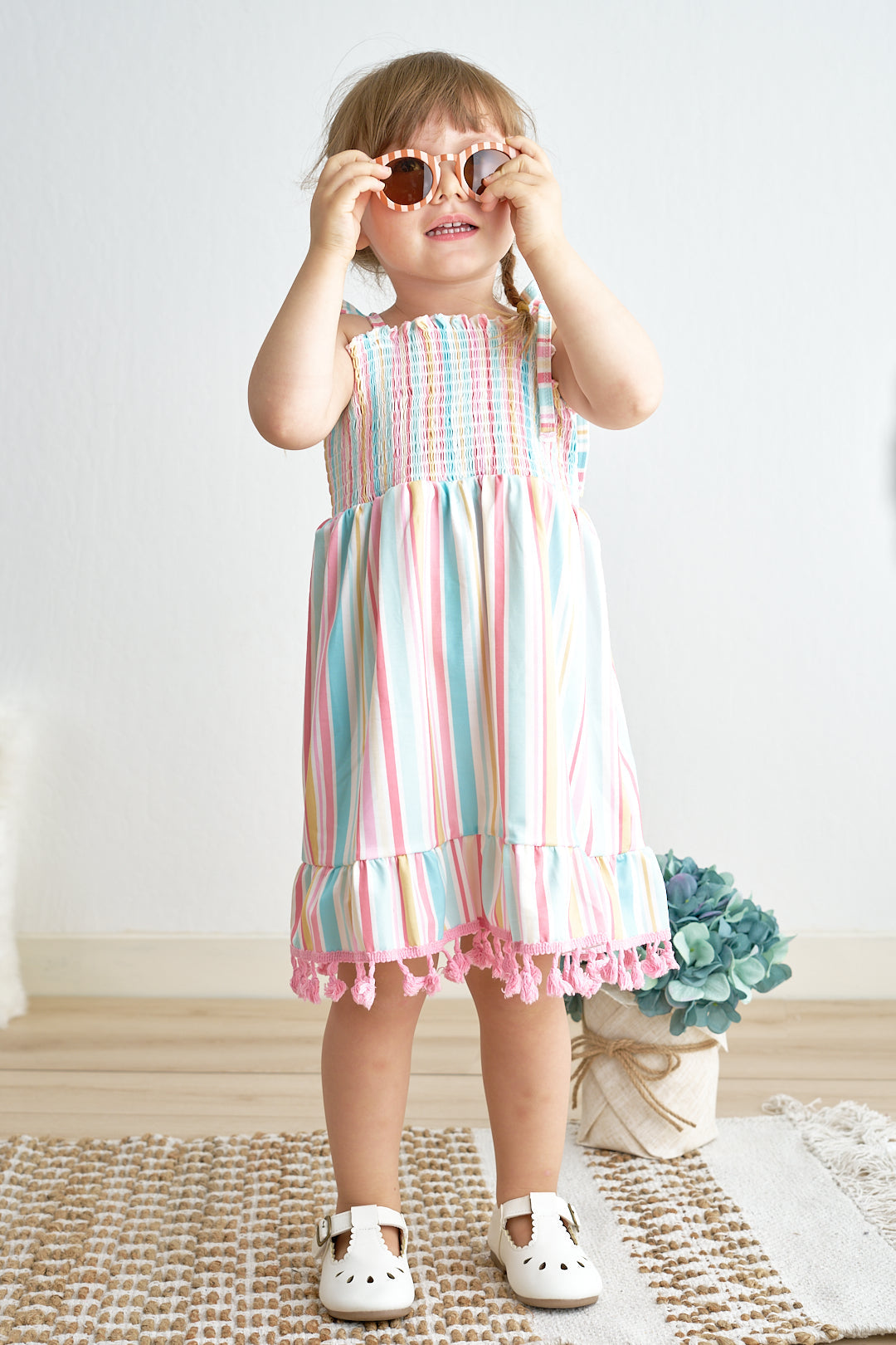 Pink stripe smocked strap dress