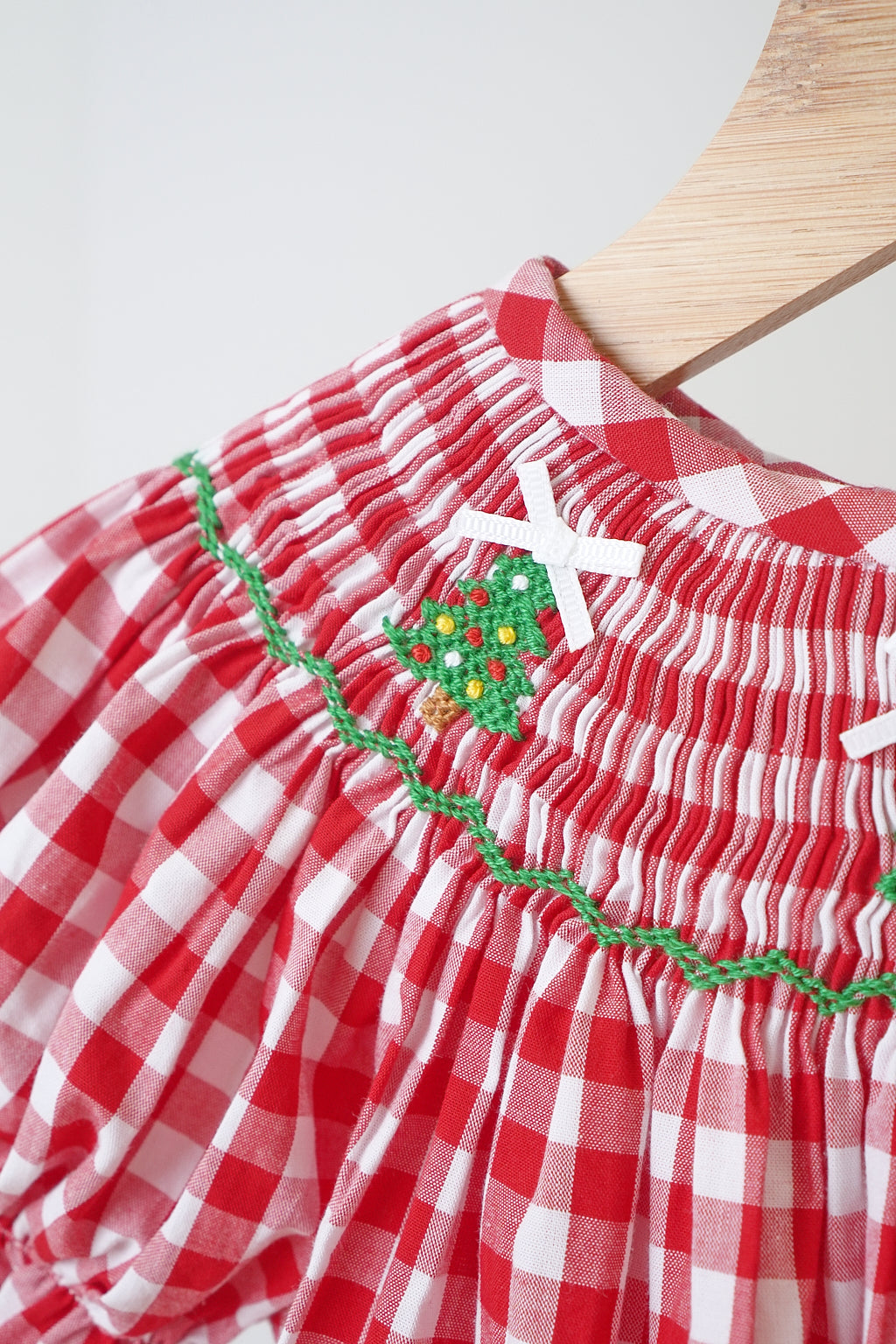 Red christmas tree hand smocked gingham romper