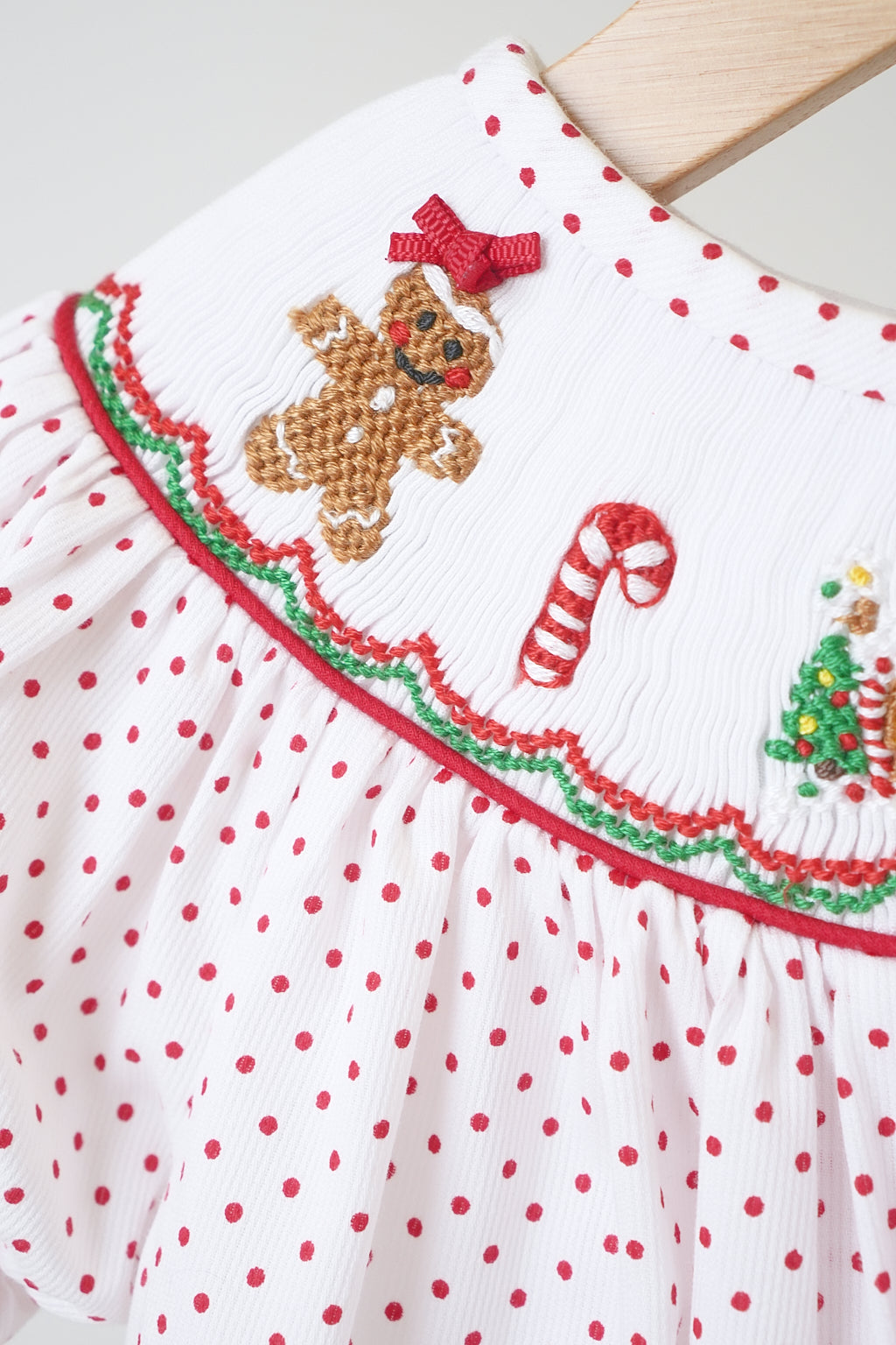 Red gingerbread hand smocked dot romper