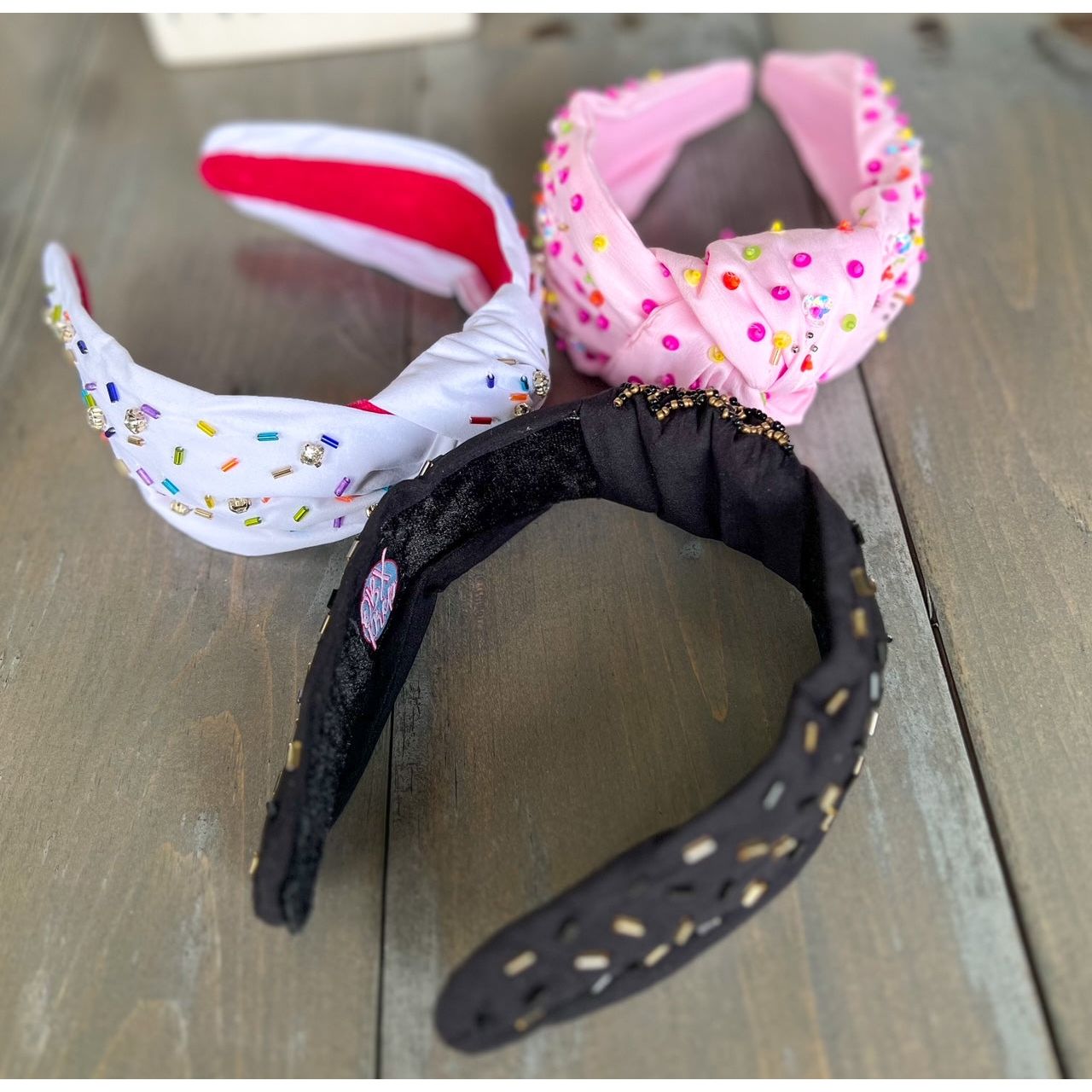 Confetti Beaded Top Knot Headband in Pink, Black and Gold, and White Multi-Colors.